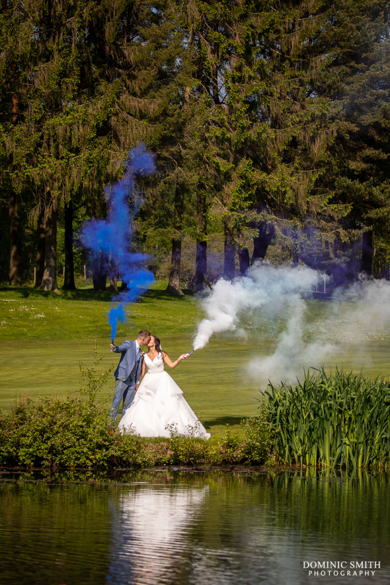Wedding Couple Photo with Smoke Bombs at Cottesmore Hotel