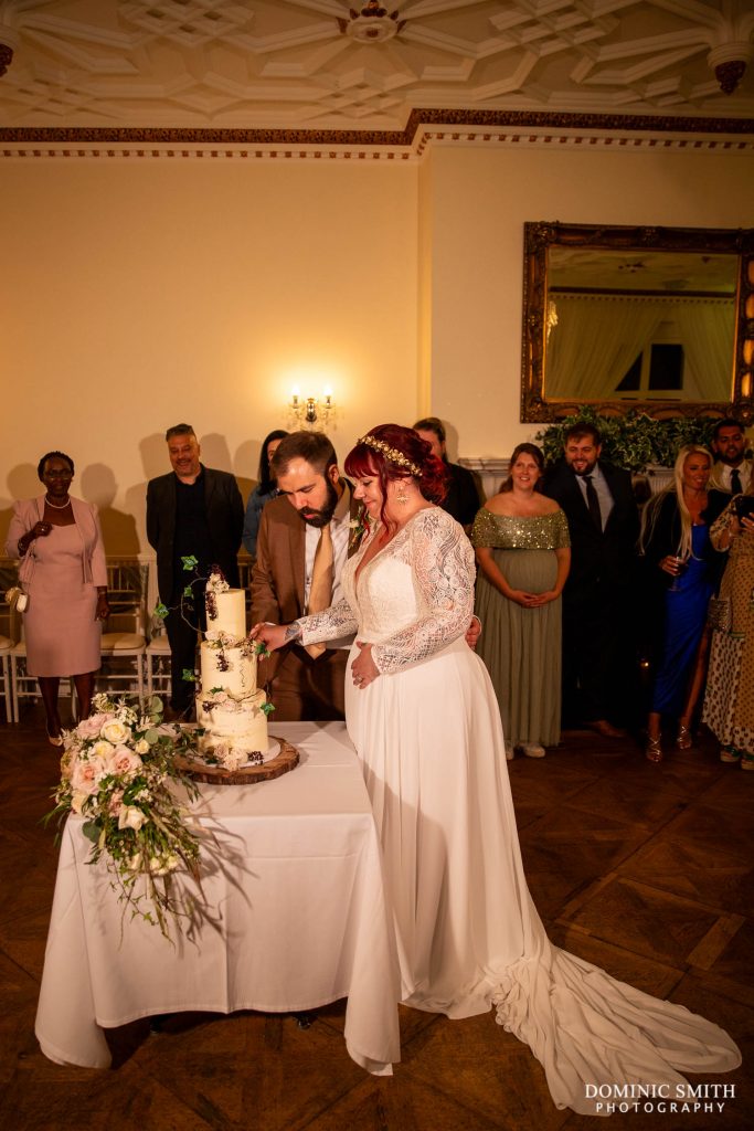 Cutting the Cake at HIghley Manor in Sussex