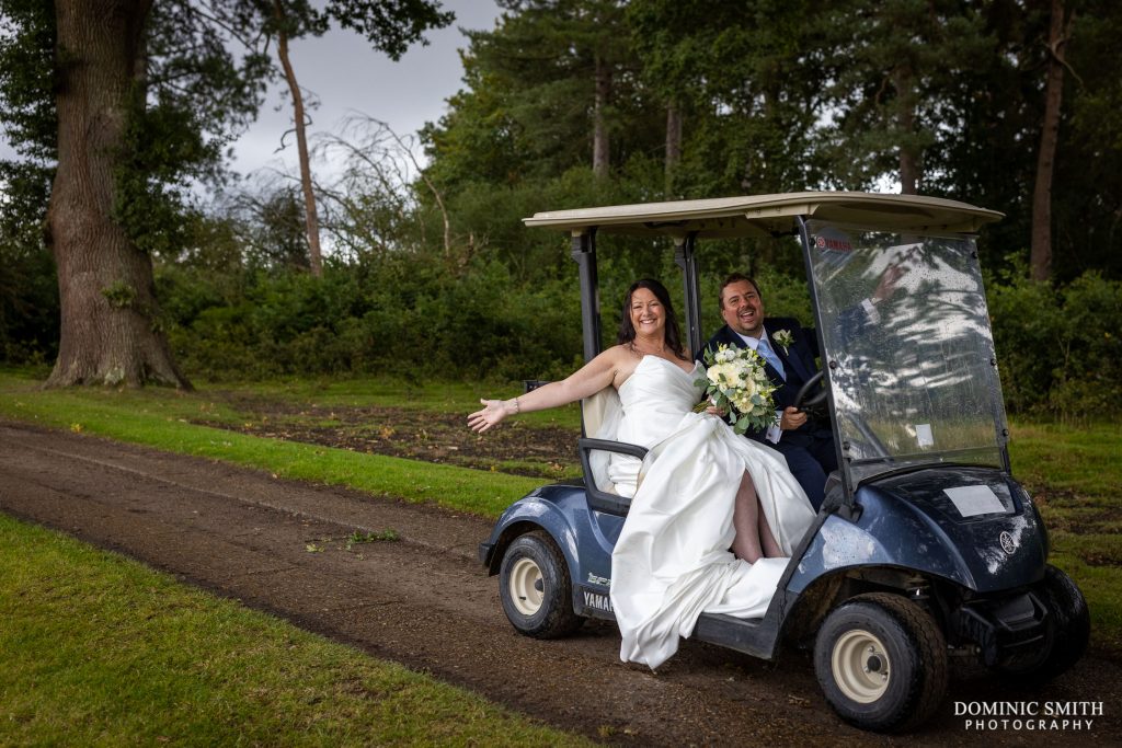 Wedding Couple on Golf Buggies at Cottesmore Hotel, Golf and Country Club