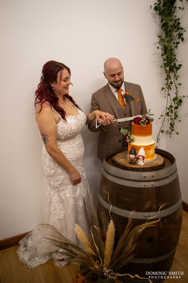 Cutting the Wedding Cake at Horam Manor Barns