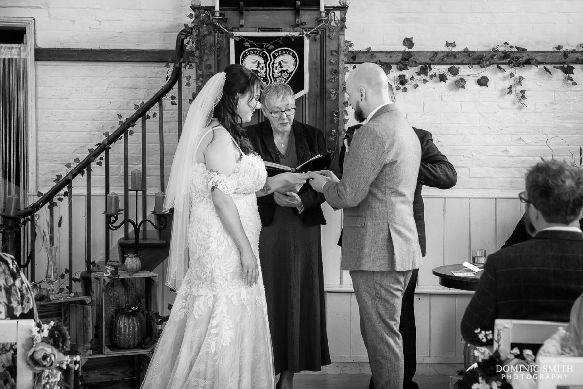 Exchanging Wedding Rings at The Chantry, Heathfield