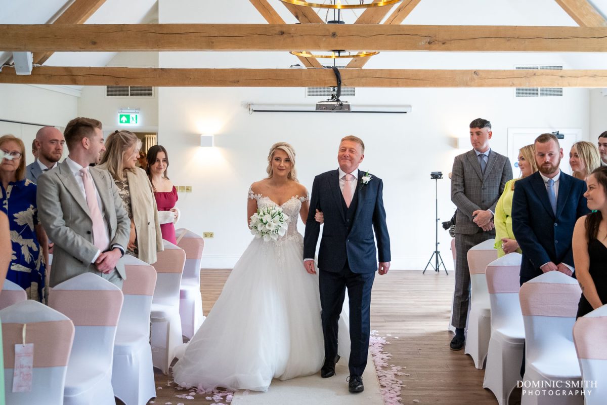 Bride and Father arriving at Cottesmore Hotel, Golf and Country Club, Sussex
