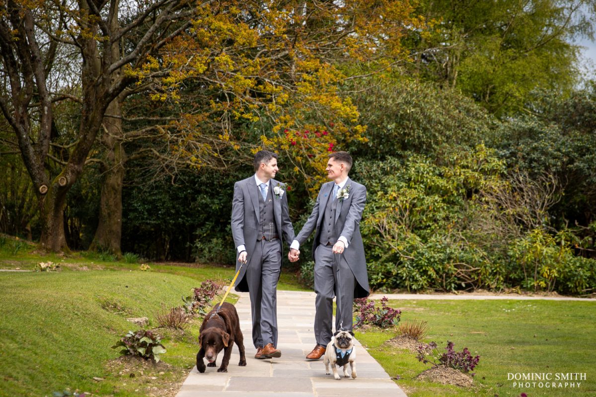 Grooms with their dogs at Highley Manor