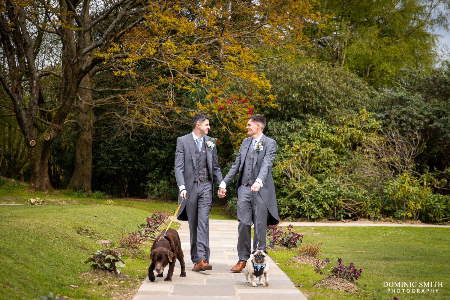 Grooms with their dogs at Highley Manor