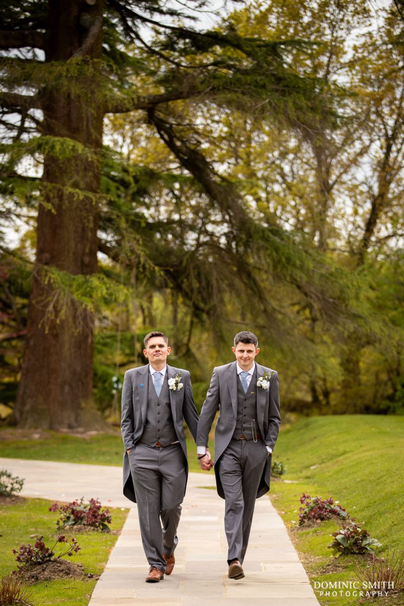 Grooms walking at Highley Manor Wedding