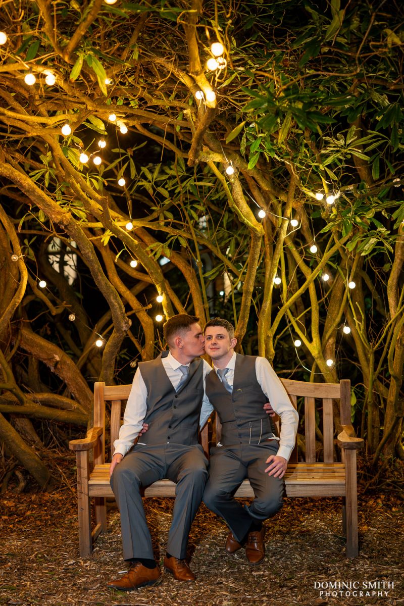 Wedding couple photo under the fairy lights at Highley Manor