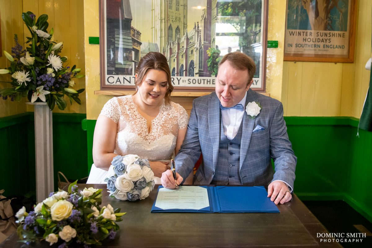 Signing the Wedding Register at Horsted Keynes Station