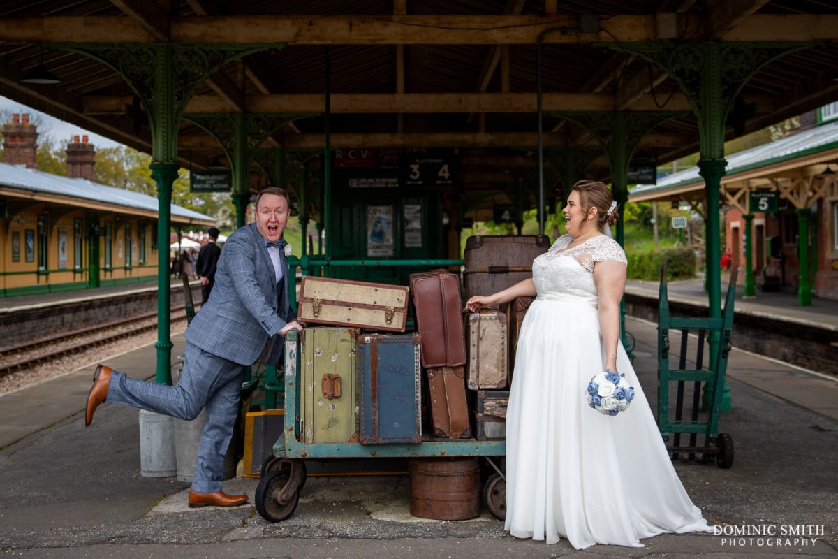 Fun Wedding Couple Photo at Horsted Keynes Station
