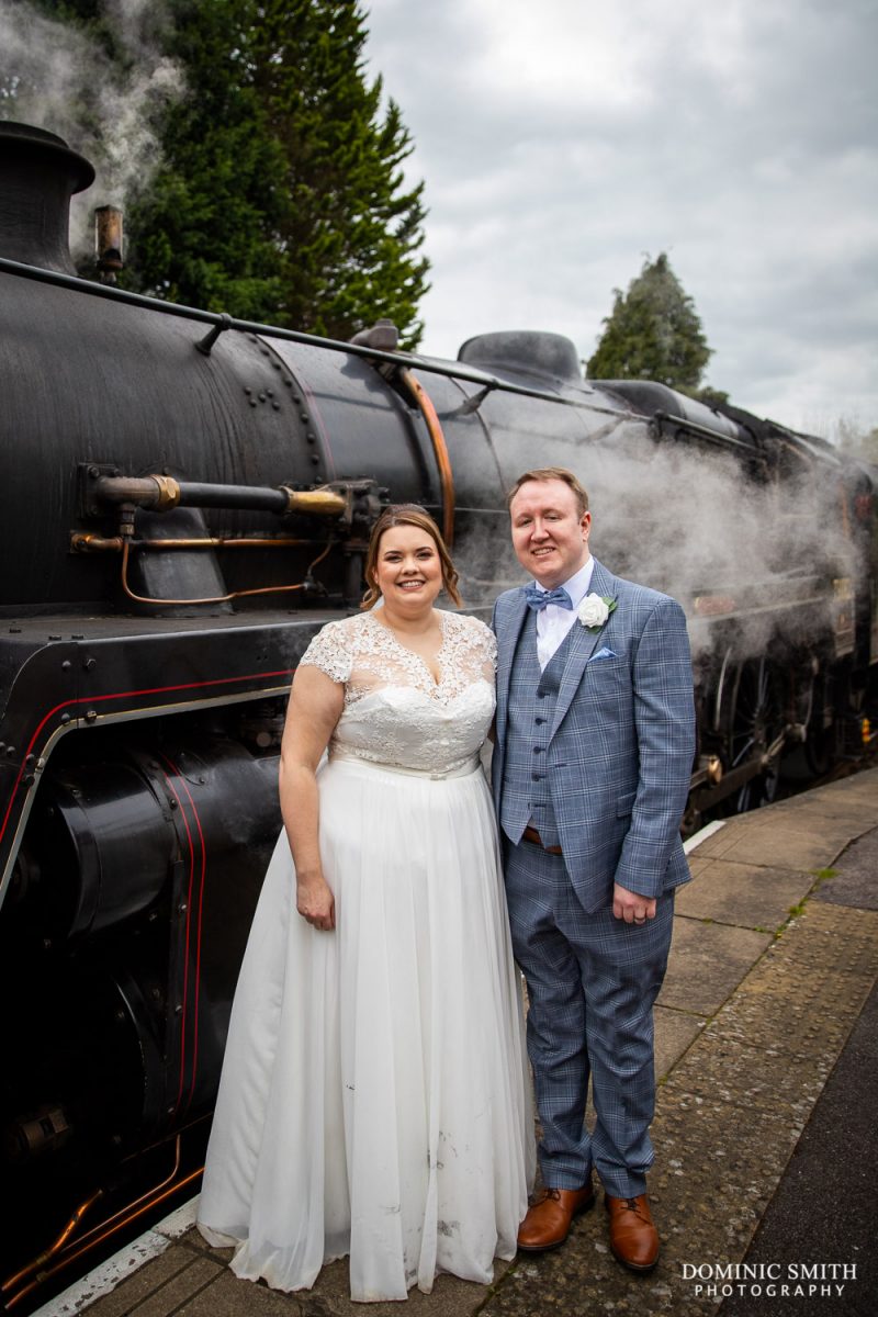 Bride and Groom with the Bluebell Railway Steam Train Wealden Rambler