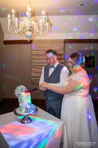 Cutting the Wedding Cake at Langshott Manor