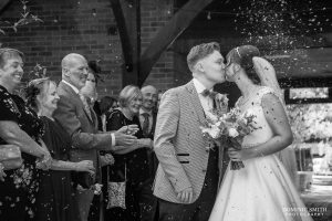 Kissing during Confetti at Cottesmore