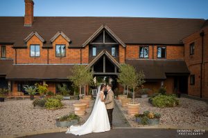 Wedding Couple at the Main Entrance of Cottesmore