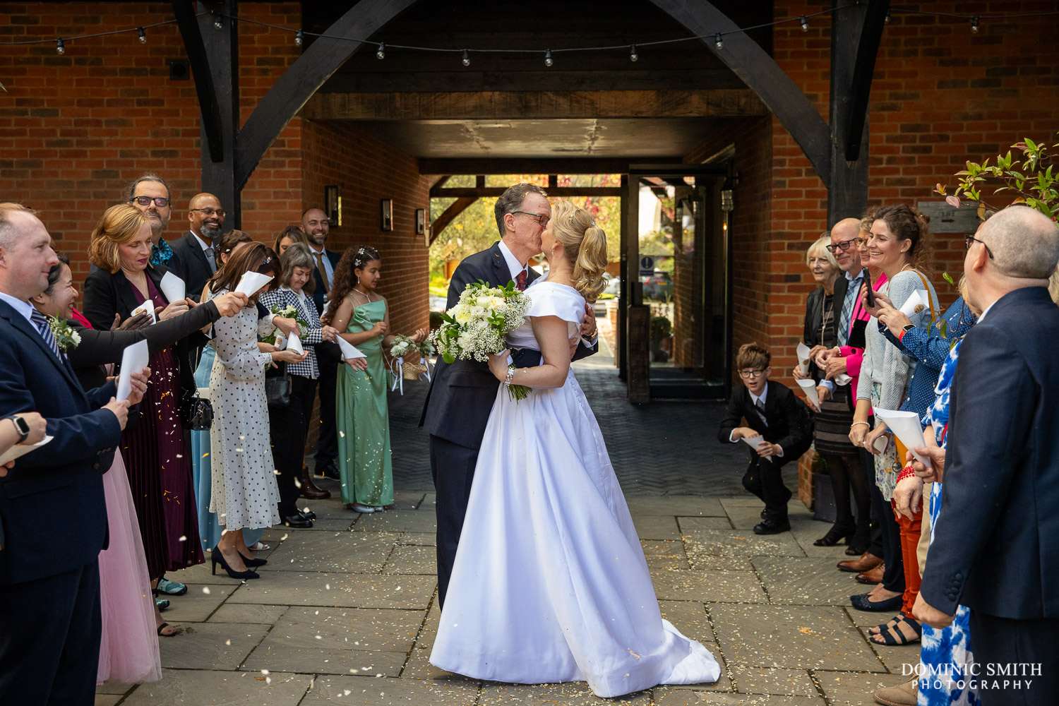 Kissing during Confetti at Cottesmore