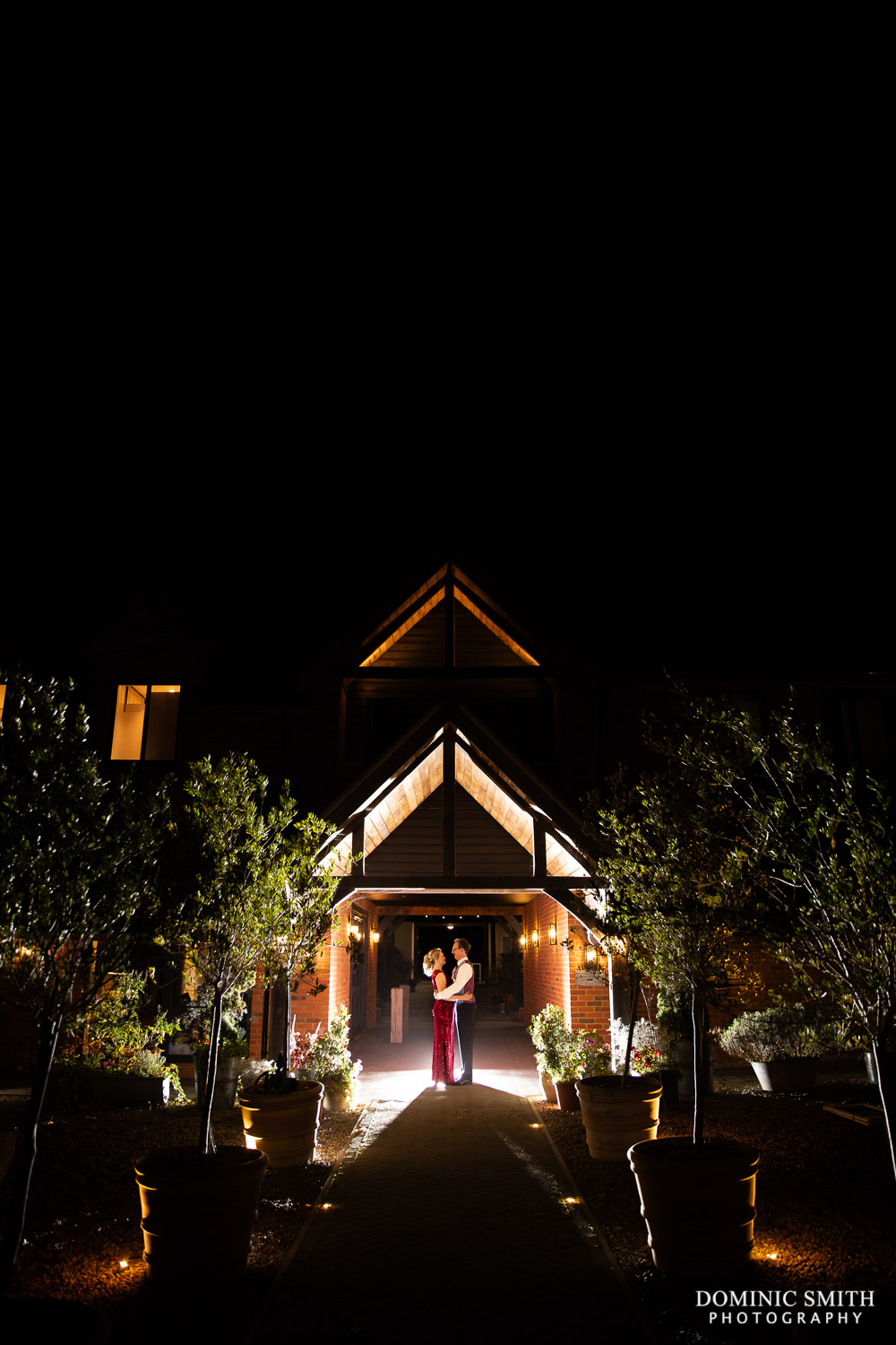 Night Time Photo of Bride and Groom at Cottesmore Hotel, Golf and Country Club, Sussex