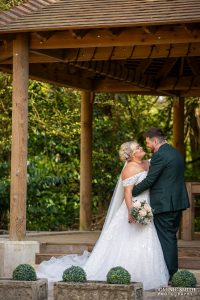 Bride and Groom Posing at Stanhill Court Hotel