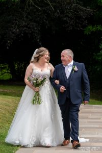 Bride and Father walking down the aisle at Highley Manor