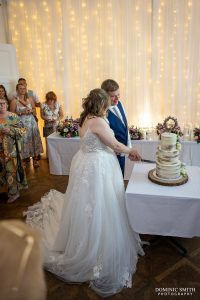 Cutting the Wedding Cake at Highley Manor
