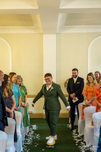 Bride skateboards into the wedding ceremony