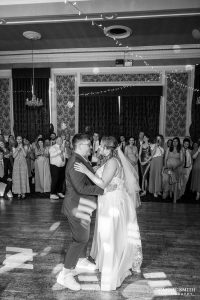 Black and White photo of two brides sharing their first dance together