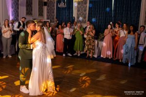 Brides sharing a kiss during first dance at Glenmore House