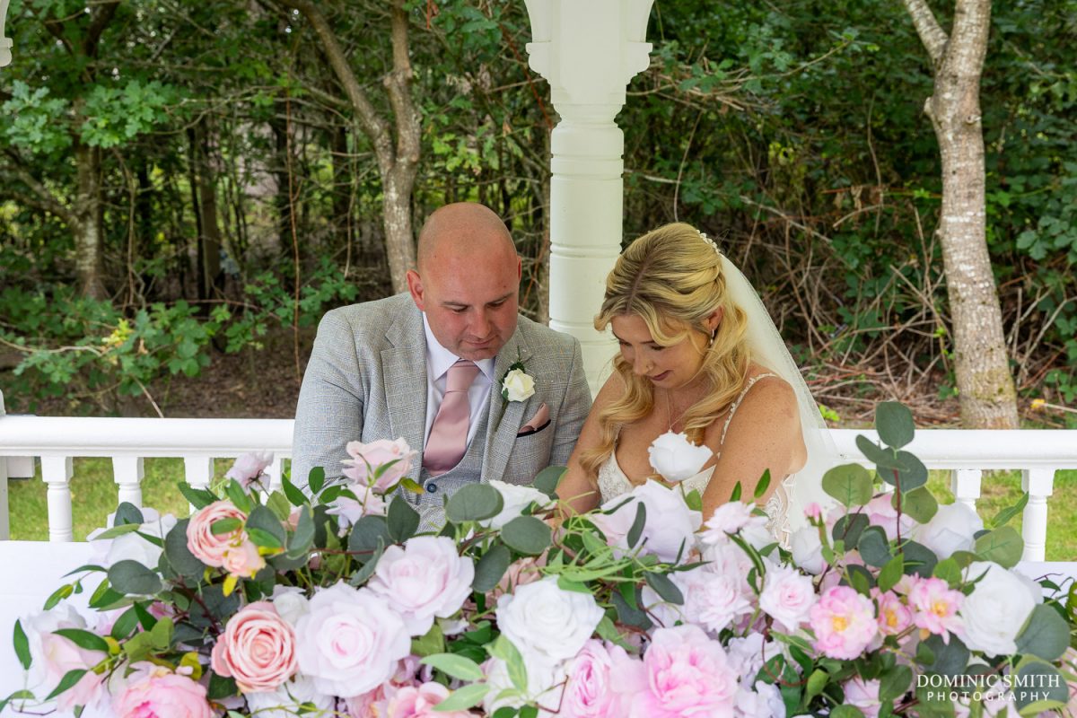 Signing the Wedding Register outside Cottesmore Golf Club