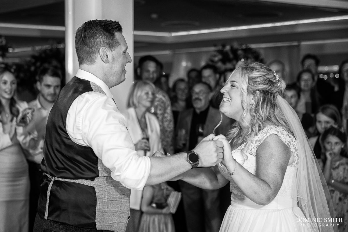 Bride and Groom share their first dance at Cottesmore Golf Club