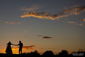 Golden hour sky with a Bride and Groom dancing at Cottesmore Hotel and Country Club
