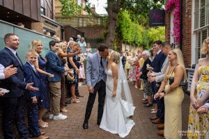 Kissing During Confetti outside One Warwick Park Hotel