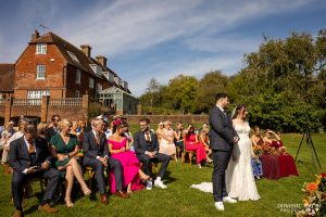 Wedding Guests during the wedding ceremony at Millwards Estate