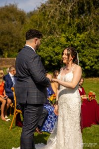 Exchanging Wedding Rings at Millwards Estate