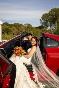 Bride Portrait in the wedding car at Millwards Estate