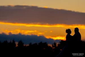 Bride and Groom photo taken during sunset at Cottesmore Golf Club