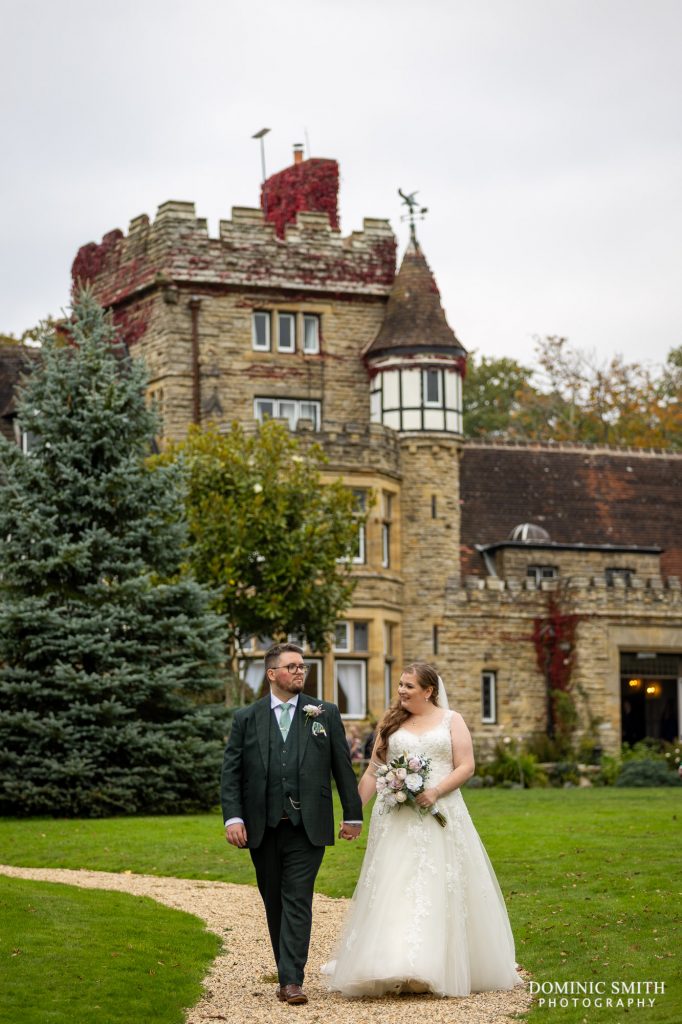 Bride and Groom walk from Ravenswood