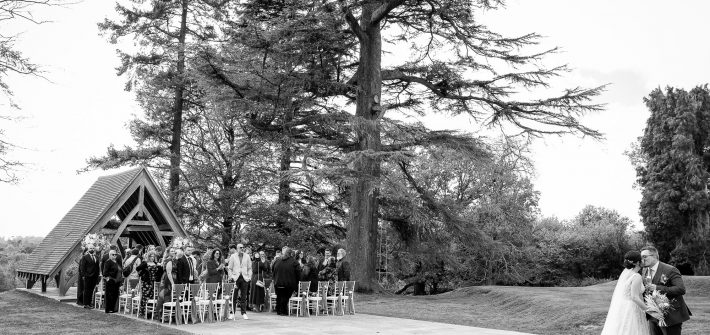 Bride and Groom with their guests outside the Highley Manor Pavilion