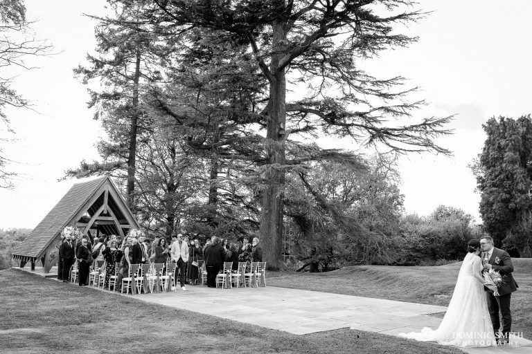 Bride and Groom with their guests outside the Highley Manor Pavilion