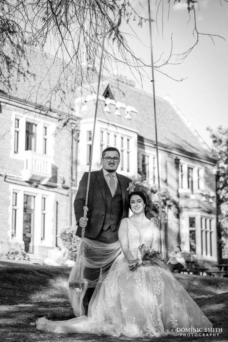Black and White photo of Bride and Groom on Highley Manor Swing