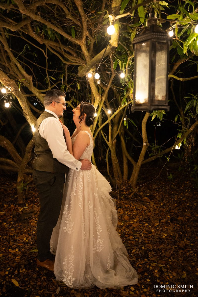 Bride and Groom share a quiet moment in the Highley Manor Secret Garden