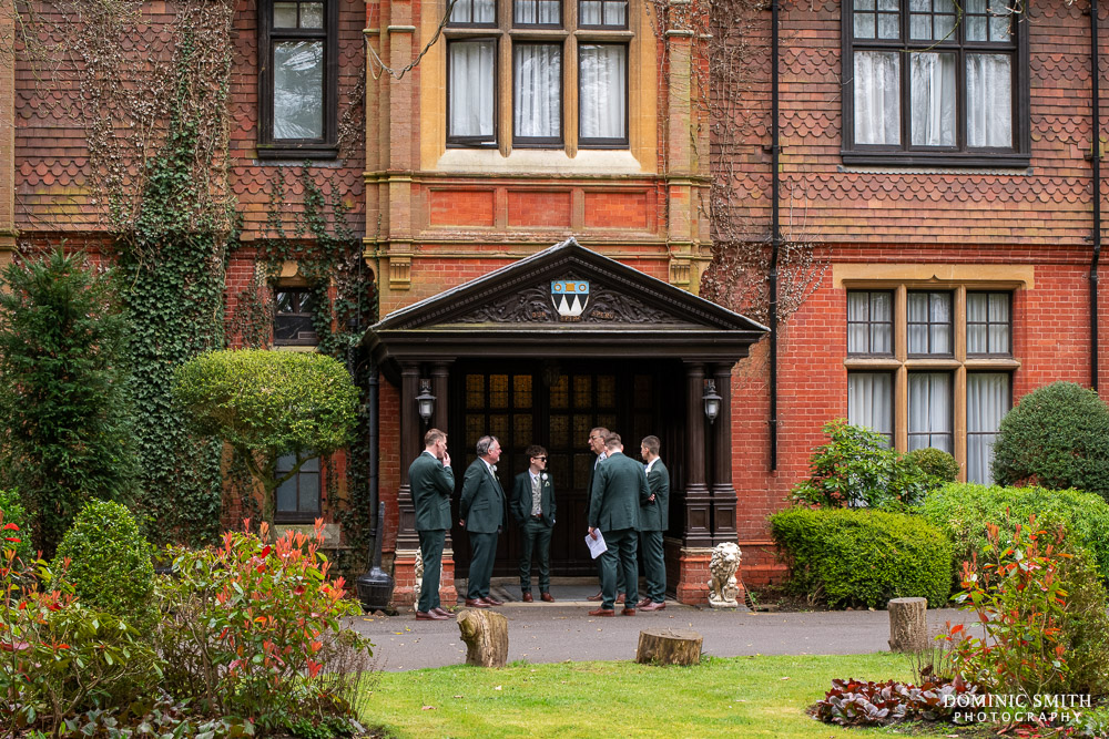 Groomsmen waiting outside Stanhill Court Hotel