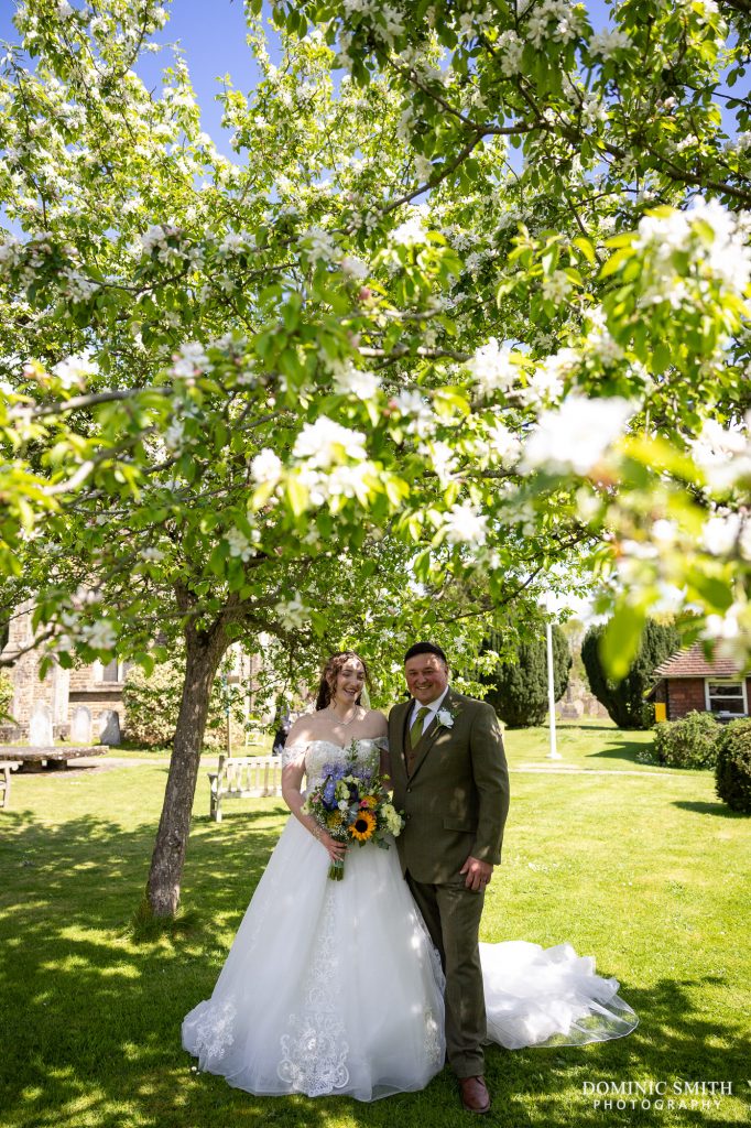 Bride and Groom portrait at St Margarets Church in Horsham
