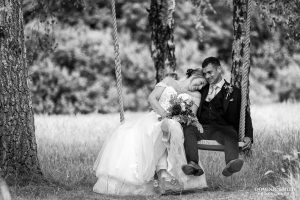 Black and White Photo of couple on the Brookfield Barn Swing