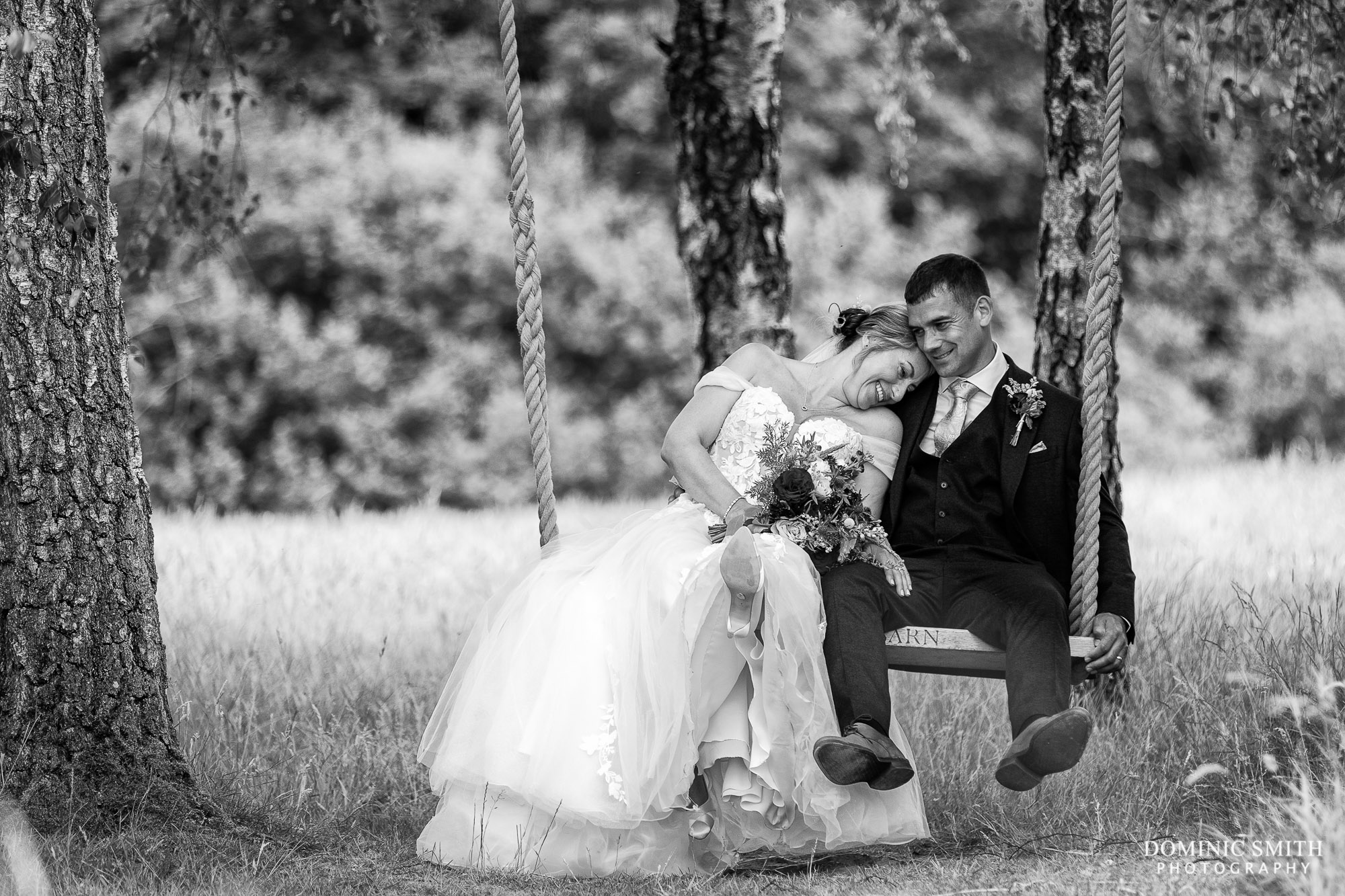 Black and White Photo of couple on the Brookfield Barn Swing