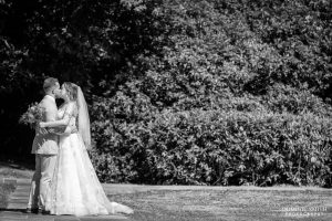 Bride and Groom sharing a kiss