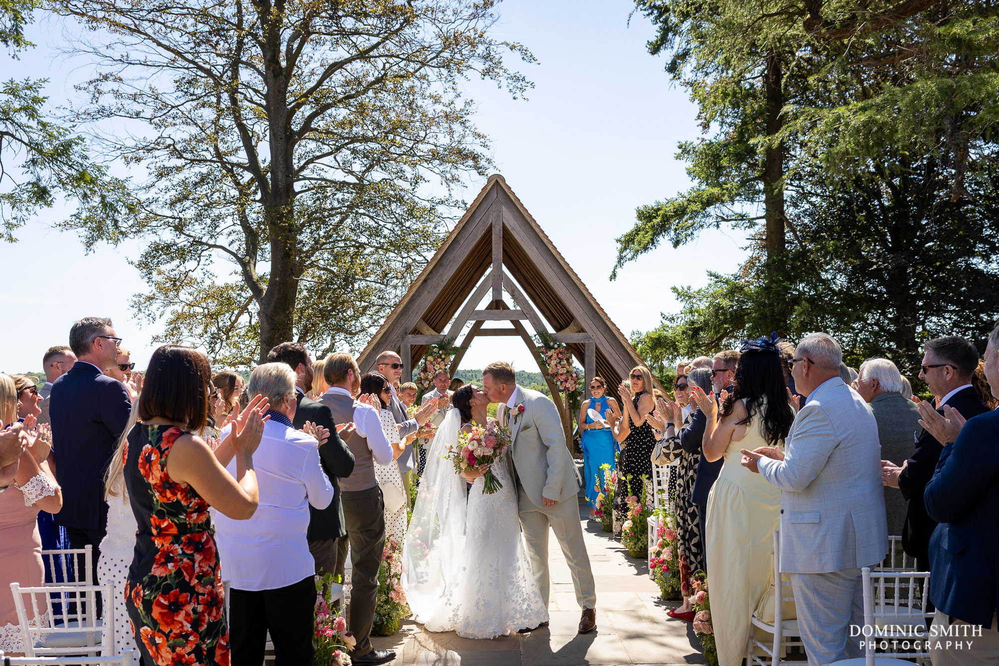 Bride and Groom kissing at Highley Manor